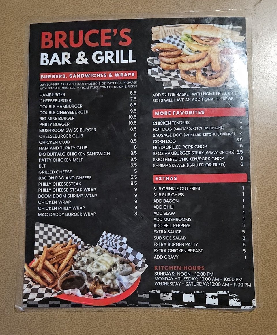 Menu page with burgers, wings, and wraps.